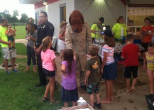 National Night Out McGruff the Crime Fighting Dog with children